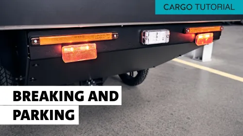 PACK close-up from behind with illuminated brake lights.